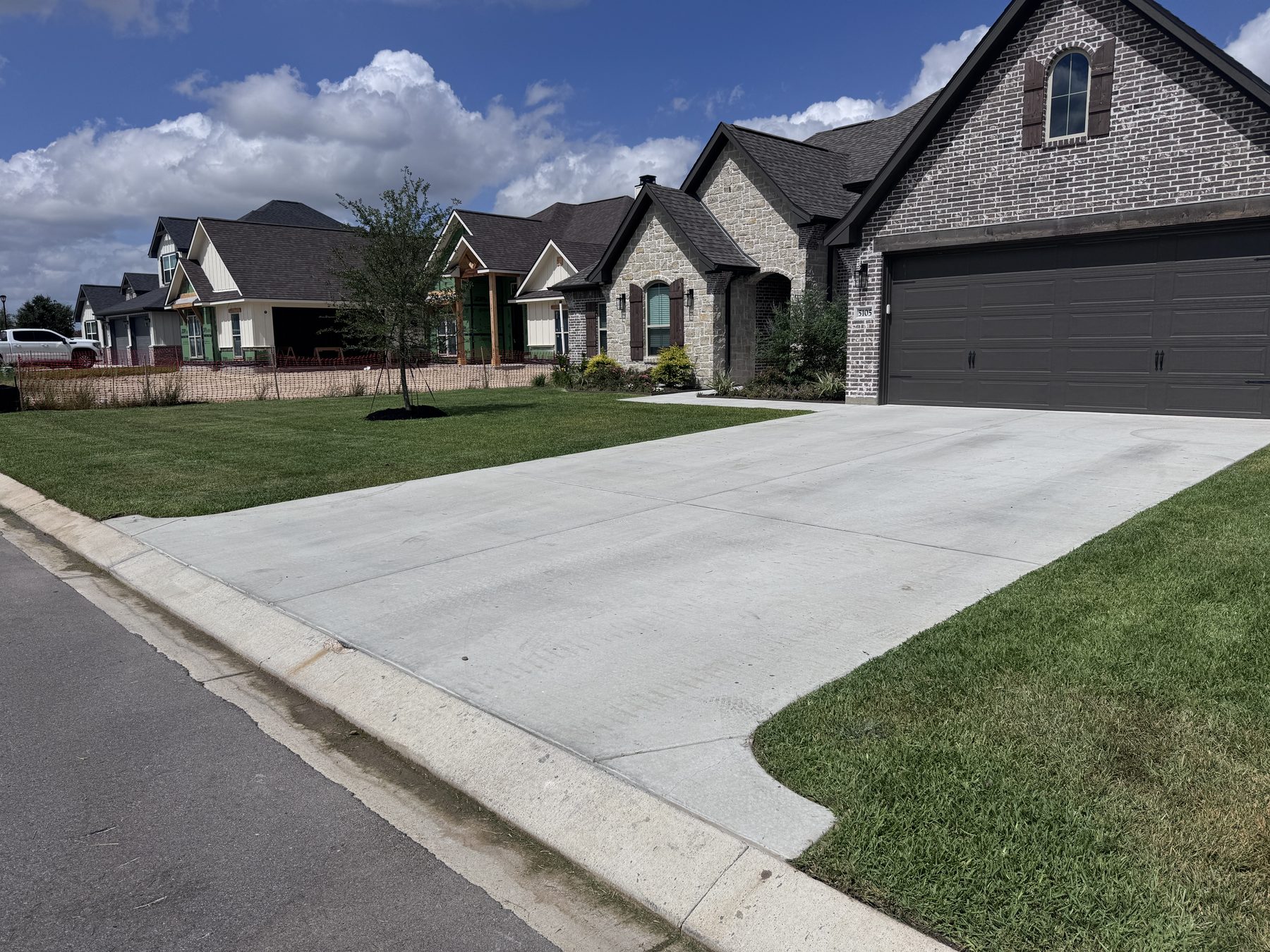 Freshly maintained residential front lawn in the Bryan and College Station area